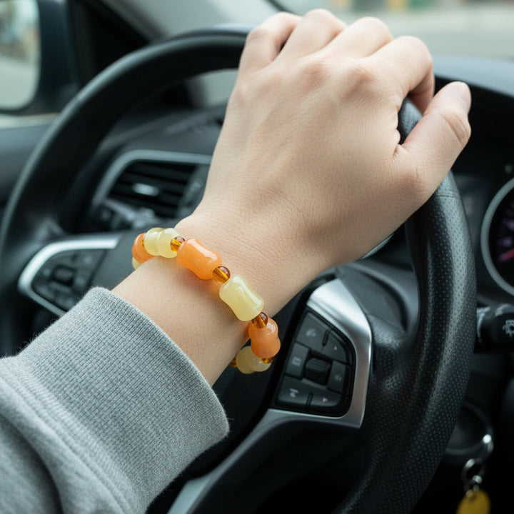 AuroraJade – Golden Silk Jade Charm Bracelet for Celestial Vitality and Grace - Mountauk